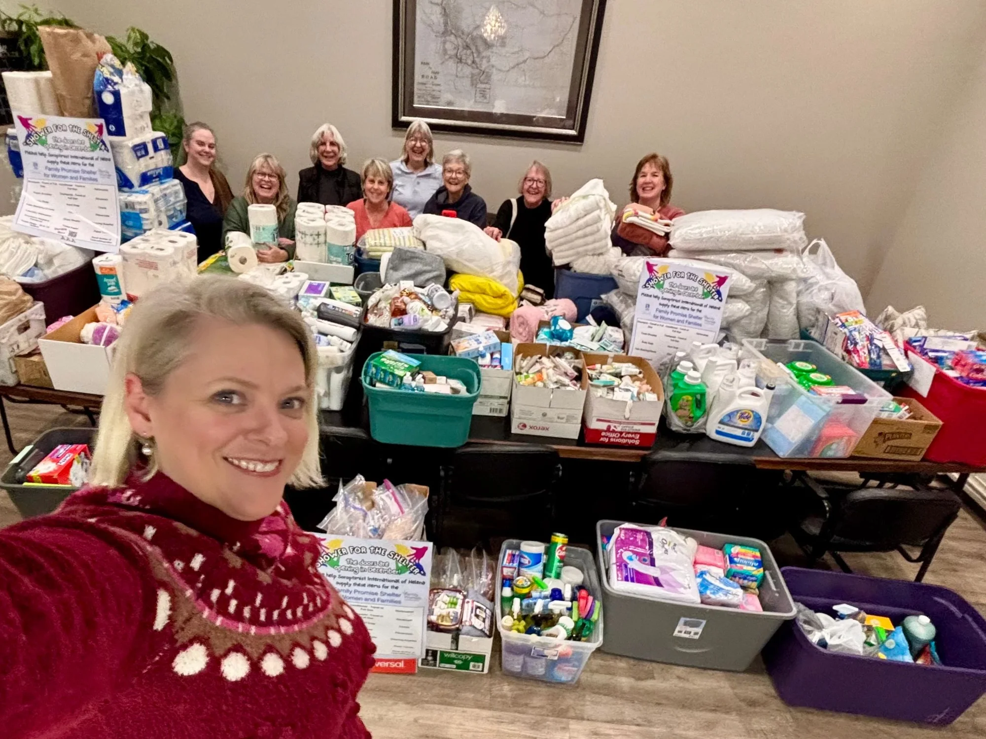 Soroptimist International of Helena members gathering donated household supplies