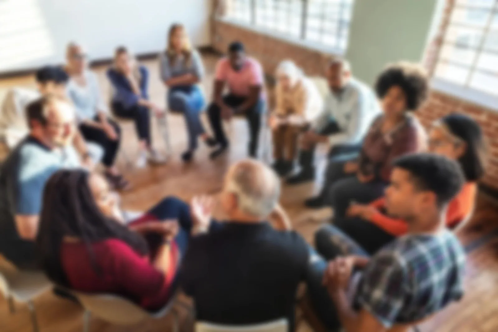 A diverse community gathered in conversation